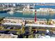 Aerial view of condo building with parking and waterfront access at 7540 Bay Island S Dr # 253, South Pasadena, FL 33707