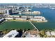 Aerial view of condo building and surrounding waterfront property at 7540 Bay Island S Dr # 253, South Pasadena, FL 33707