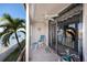 Relaxing balcony with water view and patio furniture at 7540 Bay Island S Dr # 253, South Pasadena, FL 33707