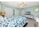 Spacious bedroom with king bed, TV, and coastal decor at 7540 Bay Island S Dr # 253, South Pasadena, FL 33707