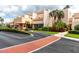 Building exterior showcasing landscaping and parking at 7540 Bay Island S Dr # 253, South Pasadena, FL 33707