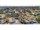 This aerial view of the home displays its location with mature trees in a quiet residential neighborhood at 90 Huron Ave, Tampa, FL 33606