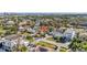 Aerial view of the home with a location pin, nestled in a lush neighborhood with easy access to city amenities at 90 Huron Ave, Tampa, FL 33606