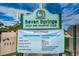 Seven Springs Golf and Country Club sign with directions to various rooms and amenities at 9204 Golf View Dr, New Port Richey, FL 34655