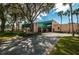 Exterior view of Seven Springs Golf and Country Club's clubhouse entrance at 9204 Golf View Dr, New Port Richey, FL 34655