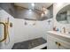 Updated bathroom with white subway tile and hexagon floor tile at 9893 111Th St, Seminole, FL 33772