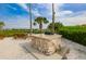 Granite-topped BBQ station nestled in a sandy picnic area at 1011 Sonata Ln, Apollo Beach, FL 33572