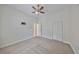 Well-lit bedroom with closet and access to a bathroom at 1011 Sonata Ln, Apollo Beach, FL 33572