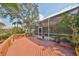 Large deck with pool and screened enclosure view at 1011 Sonata Ln, Apollo Beach, FL 33572