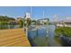 Private dock with boat lift on calm water at 1011 Sonata Ln, Apollo Beach, FL 33572