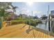 Private dock with jet ski lift and water access at 1011 Sonata Ln, Apollo Beach, FL 33572