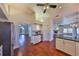 Kitchen with white cabinets, granite countertops, and breakfast bar at 1011 Sonata Ln, Apollo Beach, FL 33572