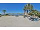 Relaxing waterfront picnic area with sandy beach and scenic views at 1011 Sonata Ln, Apollo Beach, FL 33572