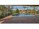 Screened pool and brick patio at 1011 Sonata Ln, Apollo Beach, FL 33572