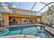 Inviting pool area with screened enclosure at 1011 Sonata Ln, Apollo Beach, FL 33572