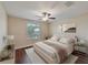 Bedroom with hardwood floors and window at 11601 Mansfield Point Dr, Riverview, FL 33569