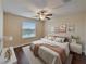 Bedroom with water view and hardwood floors at 11601 Mansfield Point Dr, Riverview, FL 33569