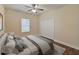 Bright bedroom with a queen bed and large closet at 11601 Mansfield Point Dr, Riverview, FL 33569