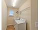 Bright laundry room with washer and dryer at 11601 Mansfield Point Dr, Riverview, FL 33569