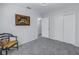 Carpeted bedroom with ample natural light and closet space at 1201 77Th N St, St Petersburg, FL 33710