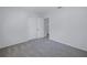 Carpeted spare bedroom with closet at 1201 77Th N St, St Petersburg, FL 33710