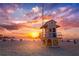 Charming lifeguard stand on a sandy beach with a sunset backdrop. Great location! at 12361 114Th St, Largo, FL 33778