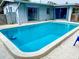 Refreshing backyard pool view, showcasing a private oasis for relaxation and enjoyment at 12361 114Th St, Largo, FL 33778