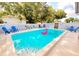 Refreshing swimming pool with a flamingo float and ample surrounding space at 12361 114Th St, Largo, FL 33778