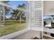 Enjoy a scenic view from the window, overlooking a beautiful landscape at 1252 Lyndhurst Greens Dr, Sun City Center, FL 33573