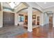 Elegant entryway with a view into the formal dining area at 13904 Shadow Tree Ln, Tampa, FL 33618