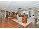 Large living room with hardwood floors and open floor plan at 13904 Shadow Tree Ln, Tampa, FL 33618