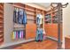 Large walk-in closet with ample shelving and hanging space at 13904 Shadow Tree Ln, Tampa, FL 33618