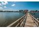 Wooden walkway over water leading to waterfront views at 14993 Imperial Point N Dr, Largo, FL 33774