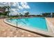 Resort-style pool with patio and plenty of space for relaxation at 14993 Imperial Point N Dr, Largo, FL 33774