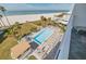 Aerial view of condo showing pool, beach, and ocean at 17980 Gulf Blvd # 403, Redington Shores, FL 33708