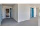 Condo hallway with door to unit and elevator at 17980 Gulf Blvd # 403, Redington Shores, FL 33708