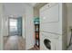 Stackable washer and dryer in a convenient laundry room at 17980 Gulf Blvd # 403, Redington Shores, FL 33708