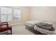 Bright bedroom with two twin beds and window coverings at 18327 Bridle Club Dr # 18327, Tampa, FL 33647