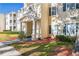 Exterior view of apartment building showcasing manicured landscaping and building facade at 18327 Bridle Club Dr # 18327, Tampa, FL 33647