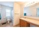 Bright bathroom featuring a tub, vanity, and updated fixtures at 18840 Parapet Pl, Land O Lakes, FL 34638