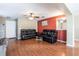 Living room features hardwood floors and neutral wall colors at 18840 Parapet Pl, Land O Lakes, FL 34638