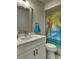 Bathroom showcasing a vanity, and tiled shower with a beach-themed curtain at 24862 Us Highway 19 N # 1602, Clearwater, FL 33763