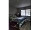 Well-lit bedroom featuring a comfortable bed and ample natural light at 24862 Us Highway 19 N # 1602, Clearwater, FL 33763