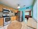 Modern kitchen with stainless steel appliances and light wood cabinets at 2526 44Th S St, St Petersburg, FL 33711