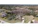 Aerial view showing a house with a large lot and pool at 2659 Keystone Springs Rd, Tarpon Springs, FL 34688