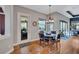 Breakfast nook with a round table and chairs, near sliding doors to patio at 2659 Keystone Springs Rd, Tarpon Springs, FL 34688