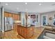 Kitchen with island, granite countertops, stainless steel appliances, and wood cabinets at 2659 Keystone Springs Rd, Tarpon Springs, FL 34688