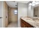 Updated bathroom with walk-in shower and granite vanity at 2733 Glenview Dr, Land O Lakes, FL 34639