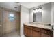 Updated bathroom with granite countertop, walk-in shower, and tile flooring at 2733 Glenview Dr, Land O Lakes, FL 34639