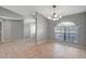 Bright dining room with tile floors and a chandelier at 2733 Glenview Dr, Land O Lakes, FL 34639